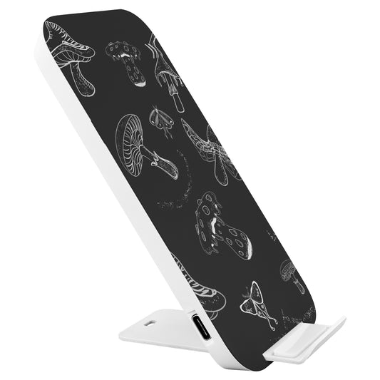 Black and white mushrooms with lunar moth phone charger